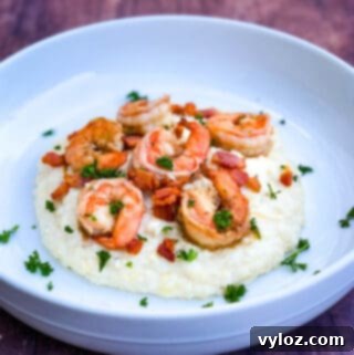 instant pot southern shrimp and grits in a white bowl