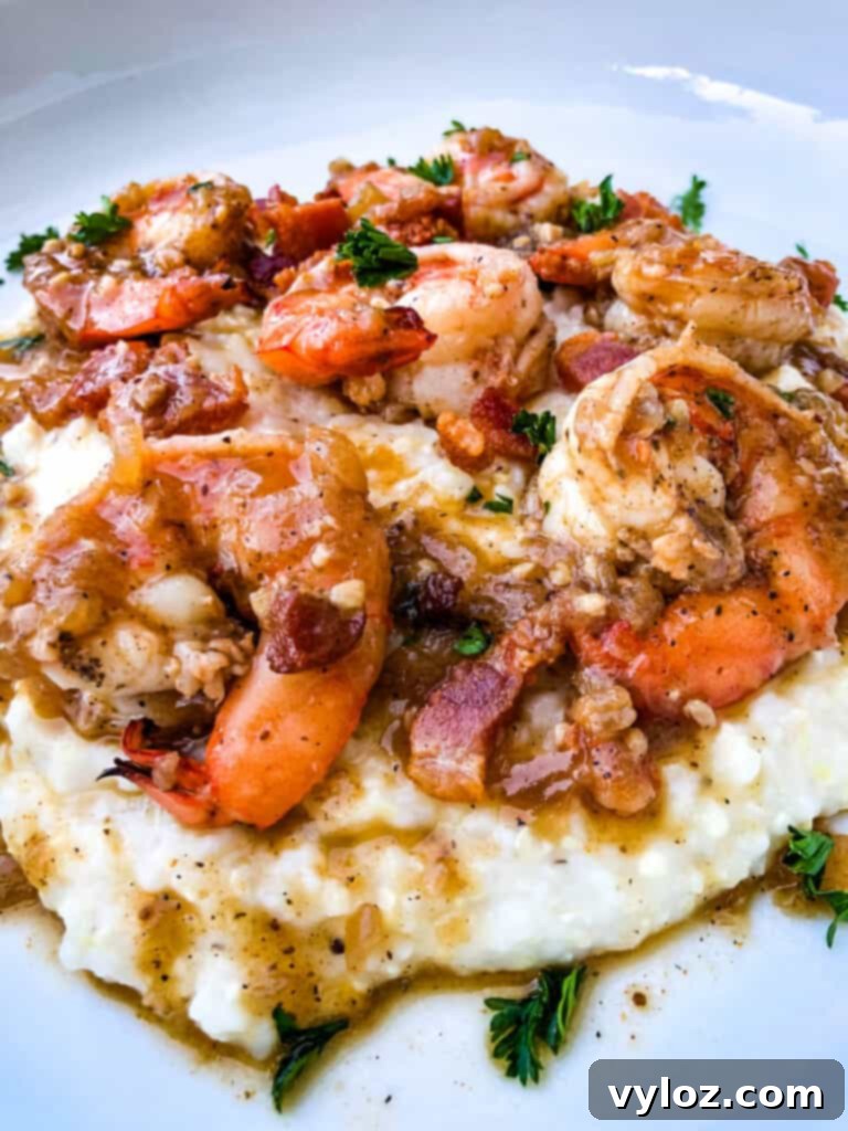 shrimp and grits on a white plate