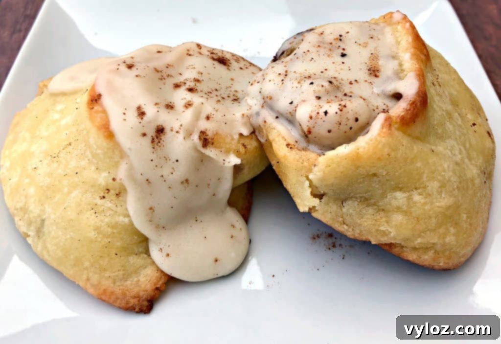 keto fathead cinnamon rolls on a white plate