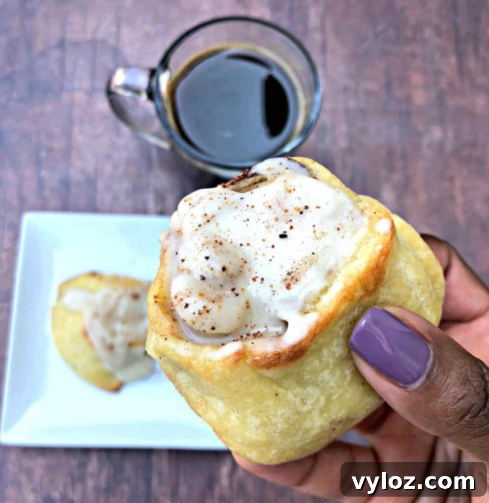 keto fathead cinnamon rolls on a white plate