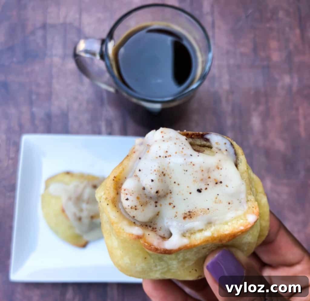 keto fathead cinnamon rolls on a white plate
