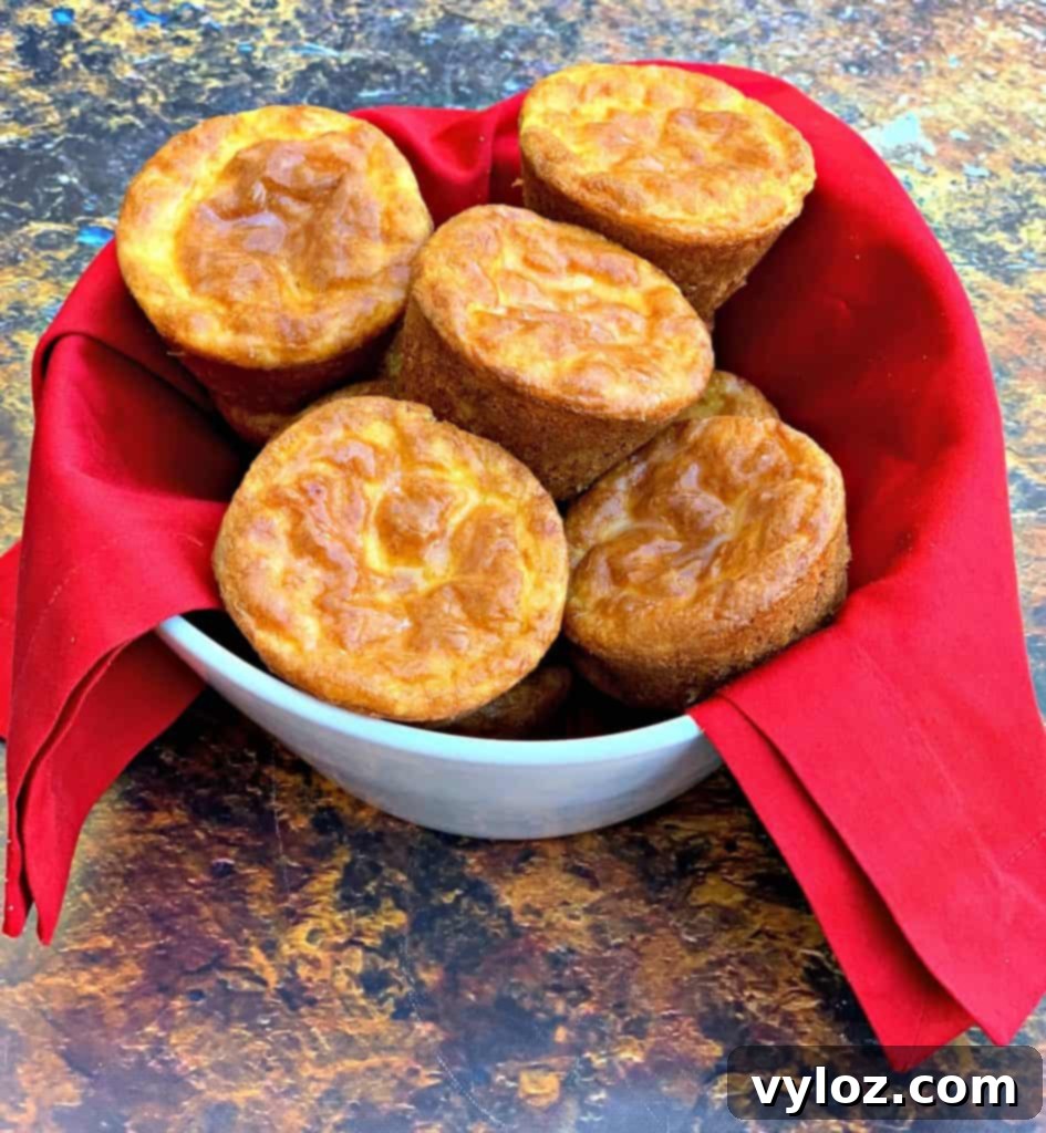 Keto biscuits in a white bowl, ready to serve