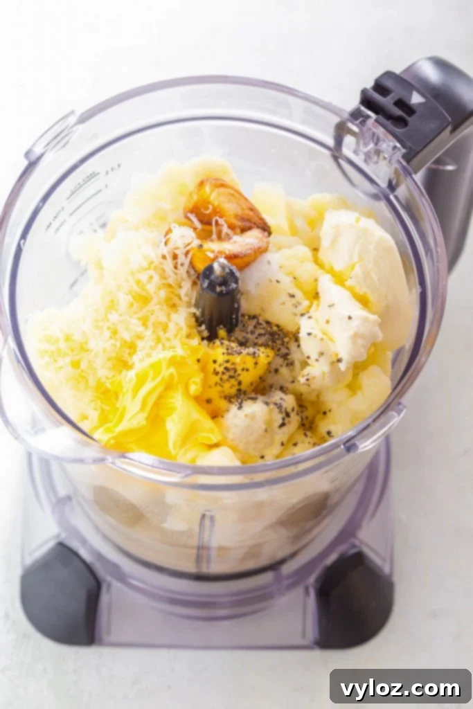 Cauliflower florets boiling in a pot on the stovetop