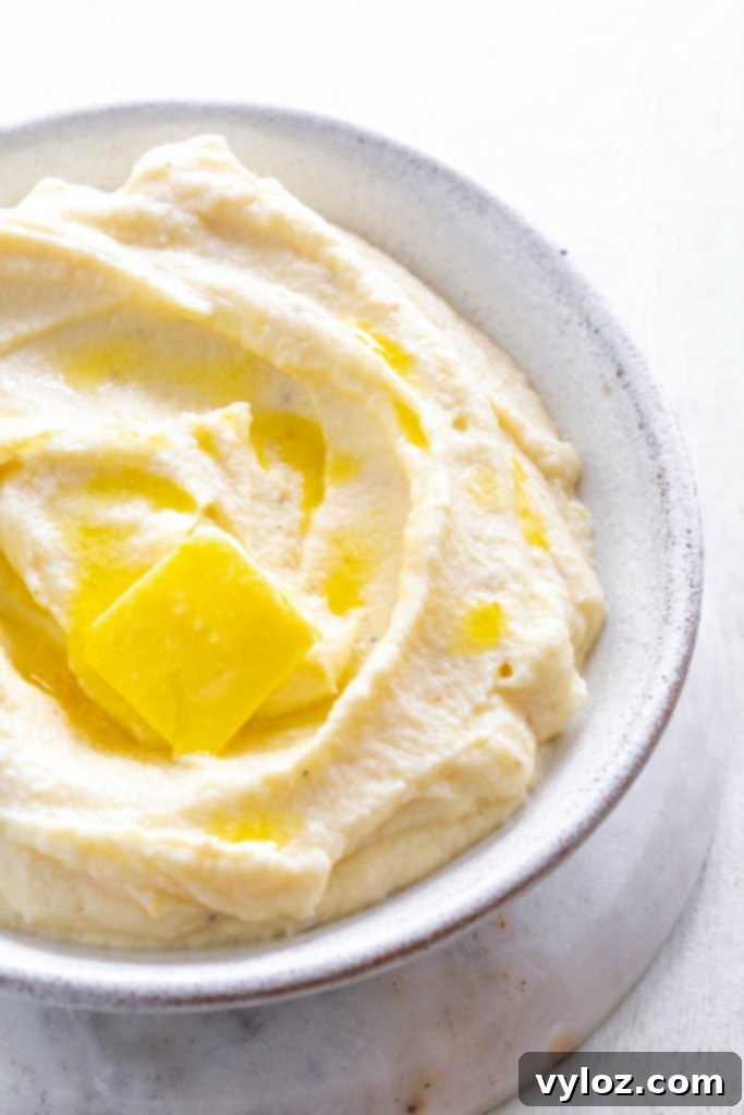 A spoonful of keto cauliflower mashed potatoes, showcasing its creamy texture