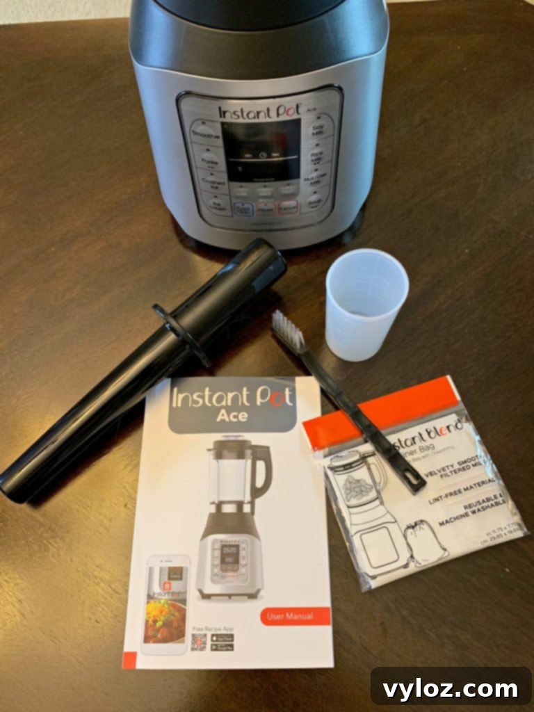 instant pot ace 60 cooking blender on a table with all boxed items