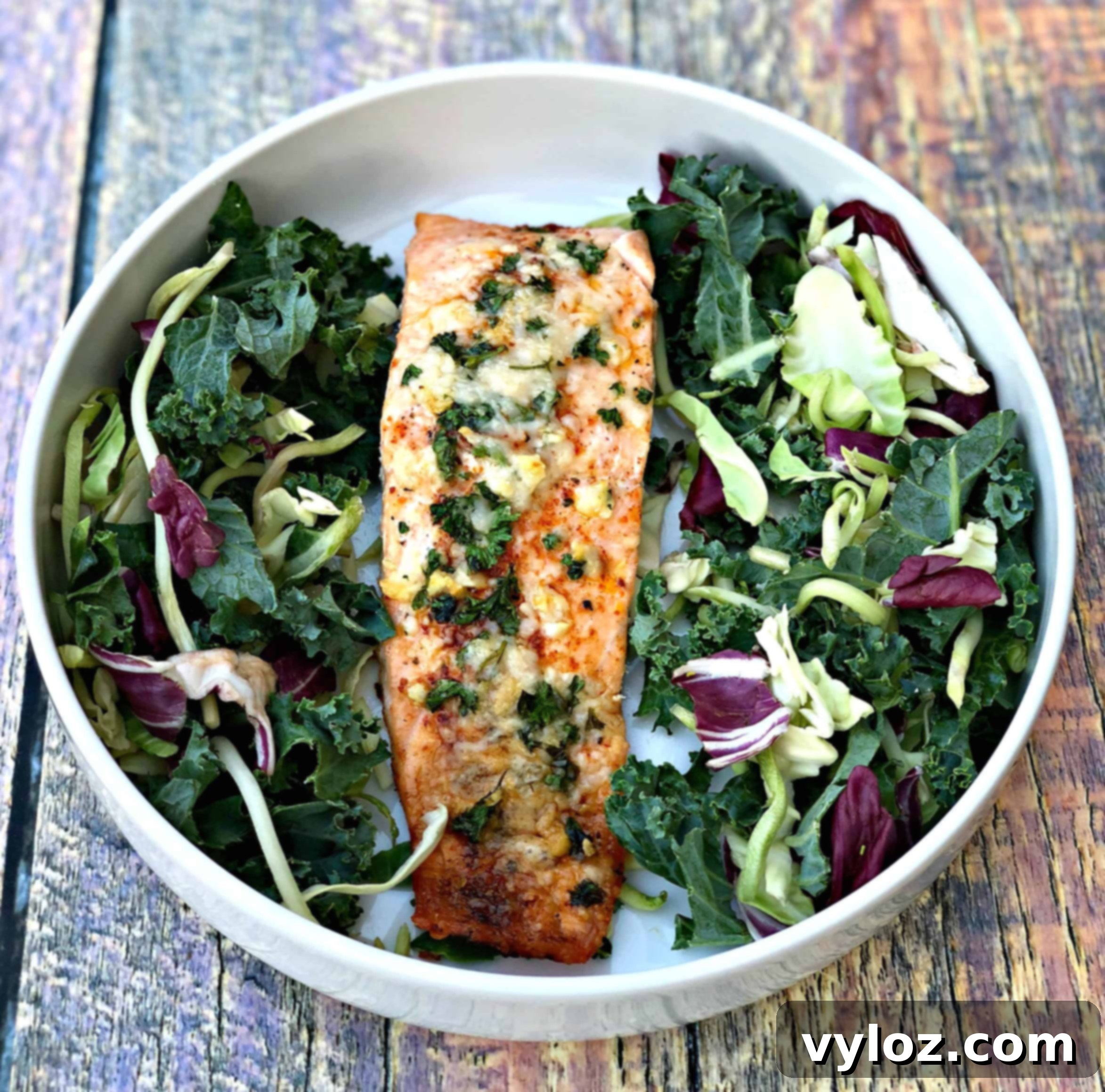 parmesan crusted salmon with herbs with salad