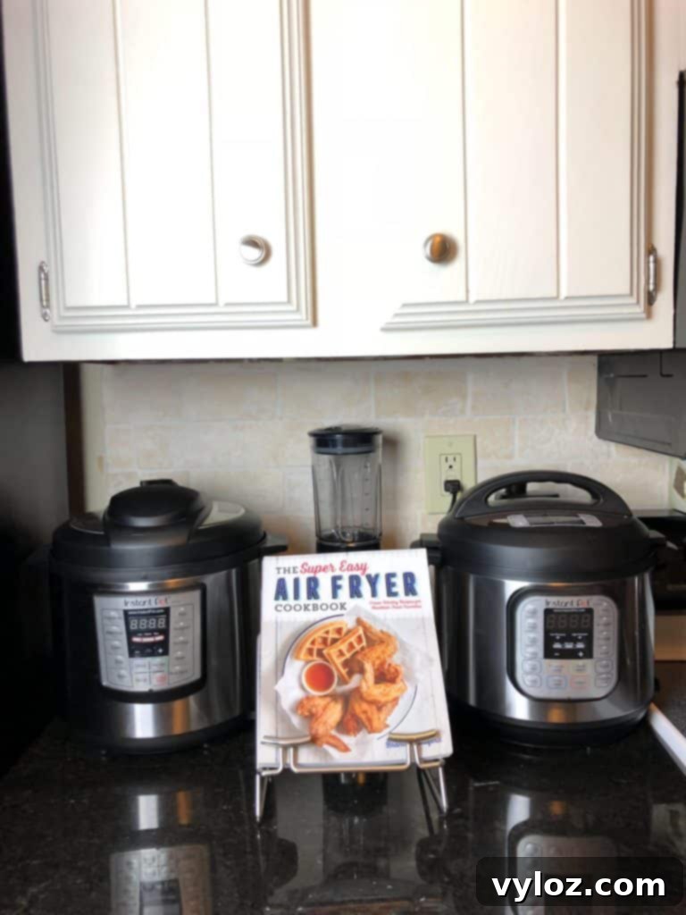 Instant Pot Essentials: Top Accessories and Gift Ideas 2 Two Instant Pot multi-cookers side-by-side on a kitchen counter, showcasing their sleek design