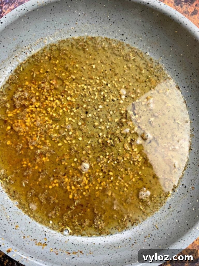 Homemade Red Lobster Garlic Shrimp Scampi 5 shrimp scampi sauce in a pan