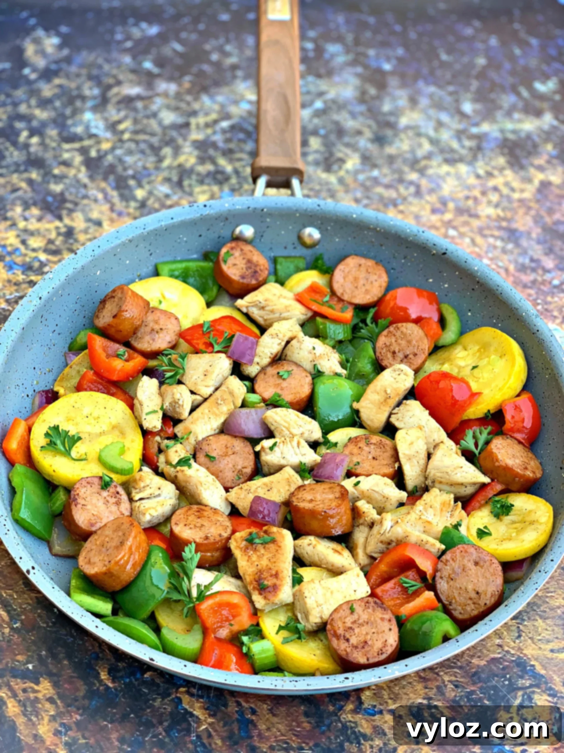 Hearty Cajun Chicken and Sausage Skillet 2 Cajun Chicken and Sausage Skillet, a vibrant and quick weeknight meal with chicken, sausage, and vegetables
