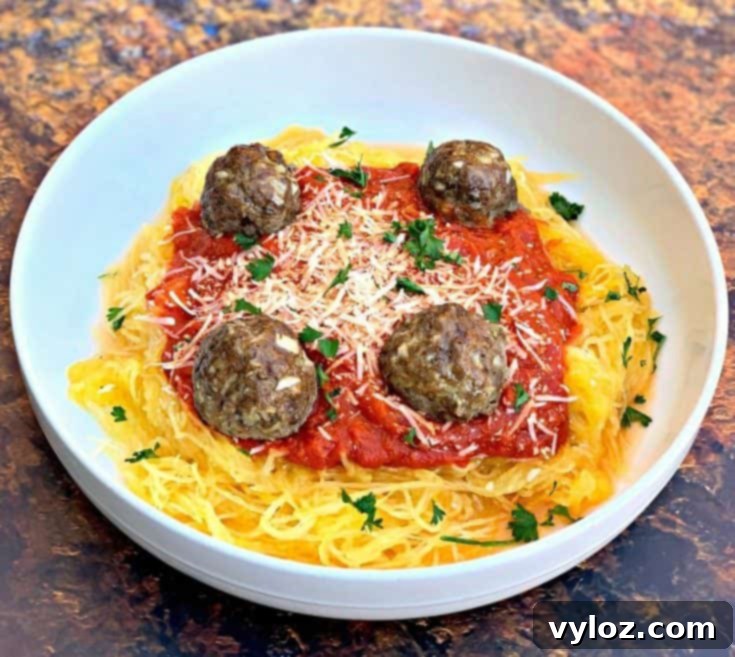 Pin this delicious low-carb spaghetti squash and meatballs recipe for later on Pinterest, ensuring you always have a healthy meal idea.
