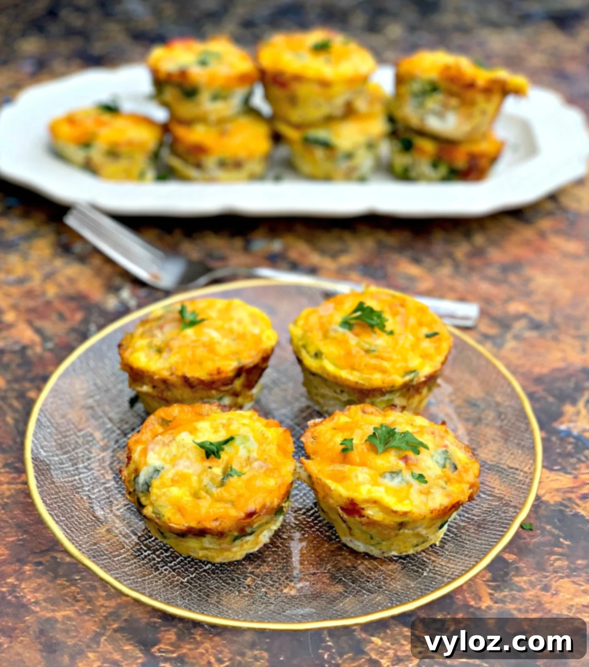 keto bacon egg bites on two plates