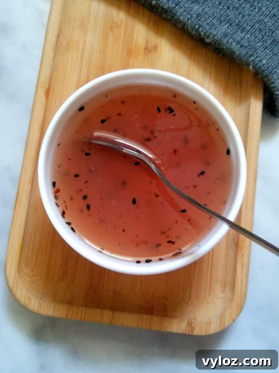 Image showing sweet onion teriyaki sauce in a white bowl, ready to be served.