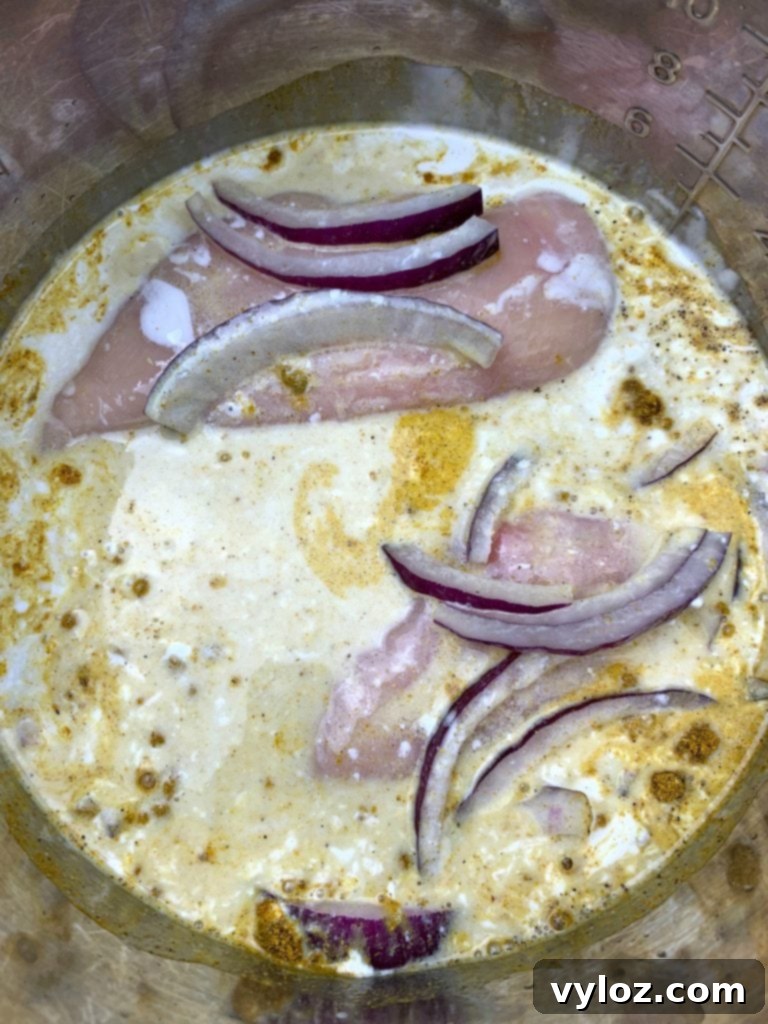 Easy Slow Cooker Curry Chicken Rice Bowls 4 curry chicken and jasmine rice in a slow cooker