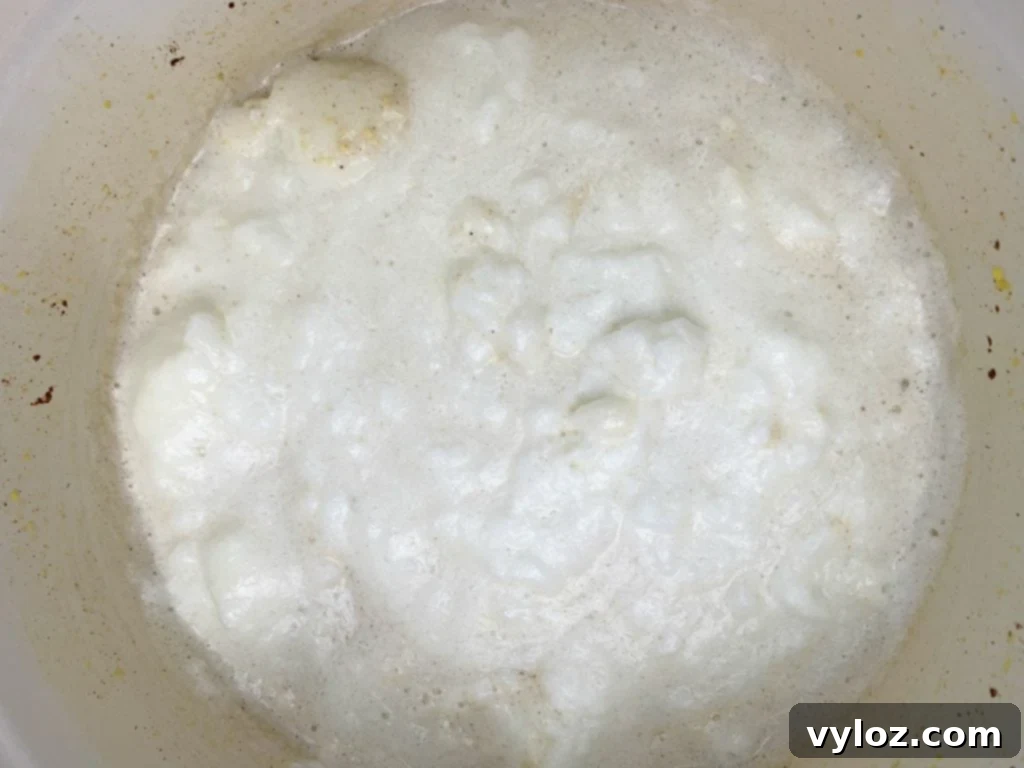 keto low carb egg nog with egg white topping in a pot