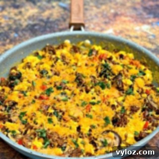 Keto Chorizo Egg and Cheese Breakfast Prep 14 keto low carb sausage breakfast scramble in a skillet