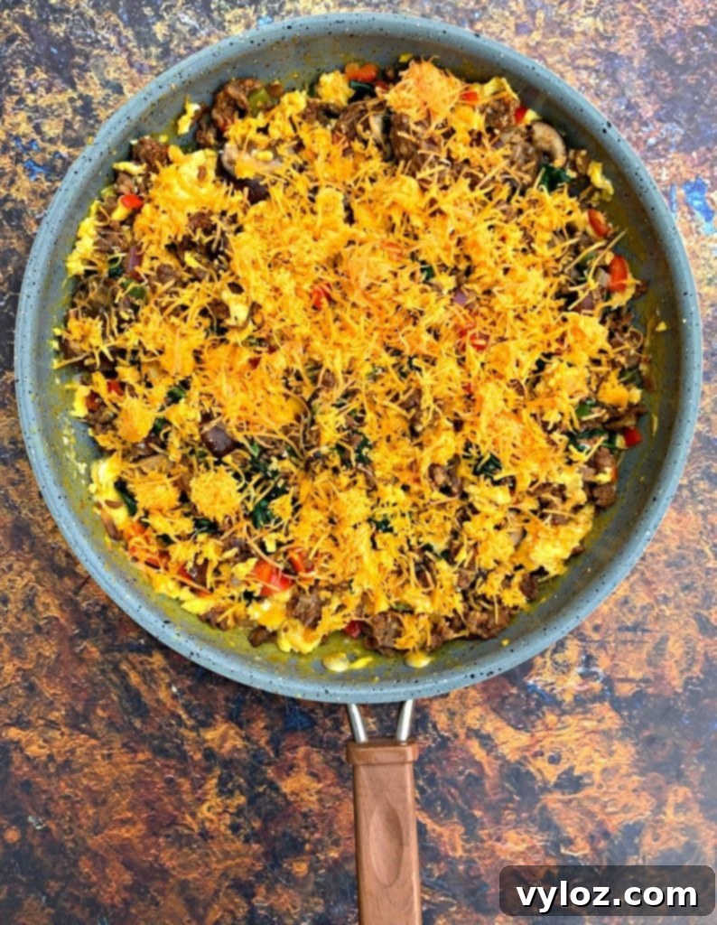 Keto Chorizo Egg and Cheese Breakfast Prep 9 keto low carb sausage breakfast scramble in a skillet