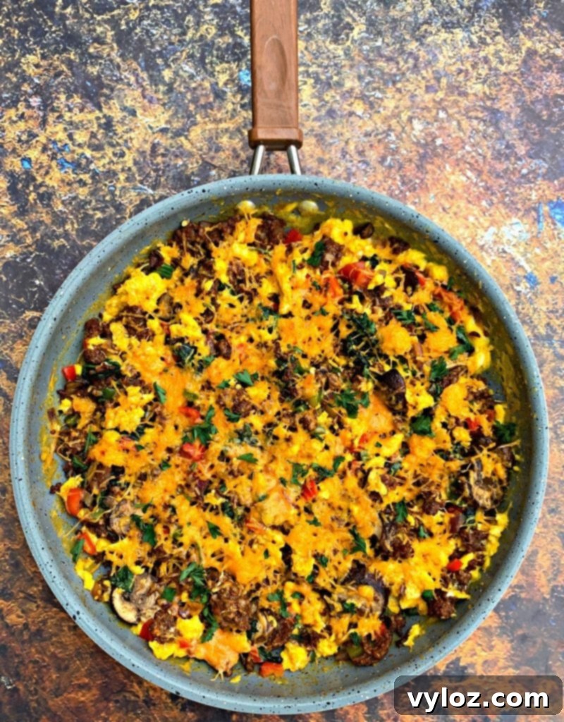 Keto Chorizo Egg and Cheese Breakfast Prep 10 keto low carb sausage breakfast scramble in a skillet