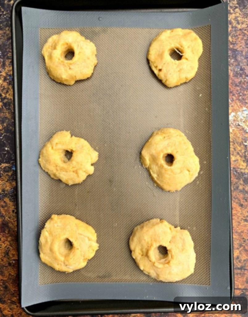 Keto fathead bagel dough on a baking mat