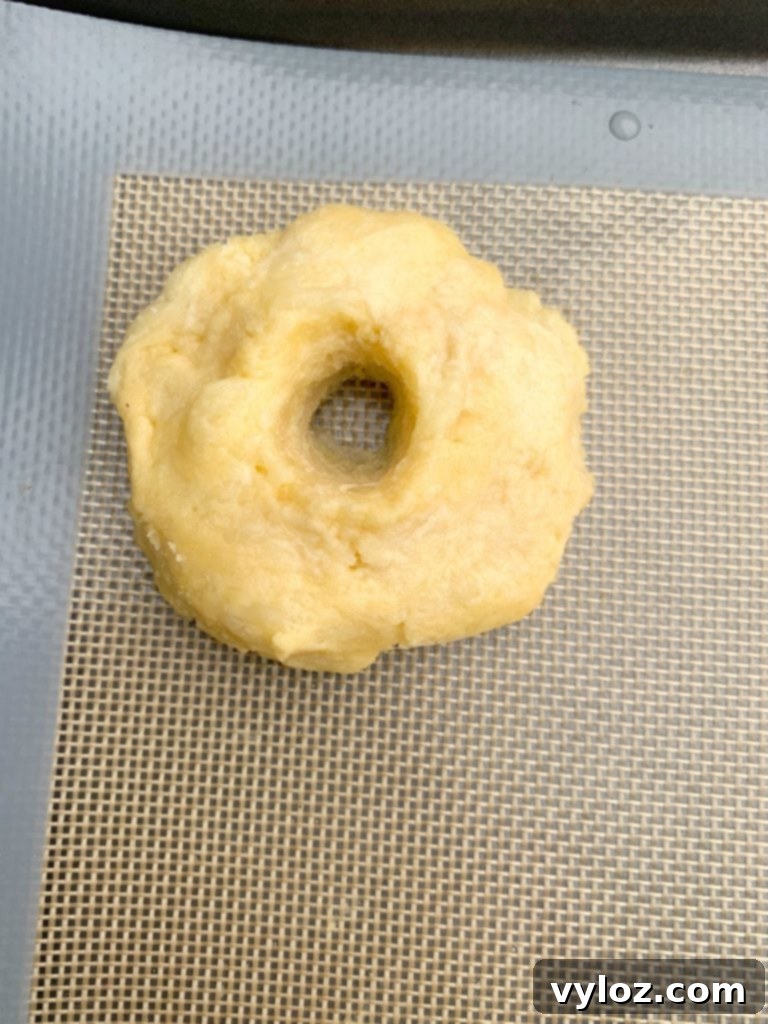 Keto fathead bagel dough on a baking mat