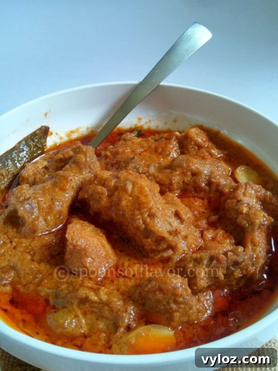 Chicken korma in a white bowl