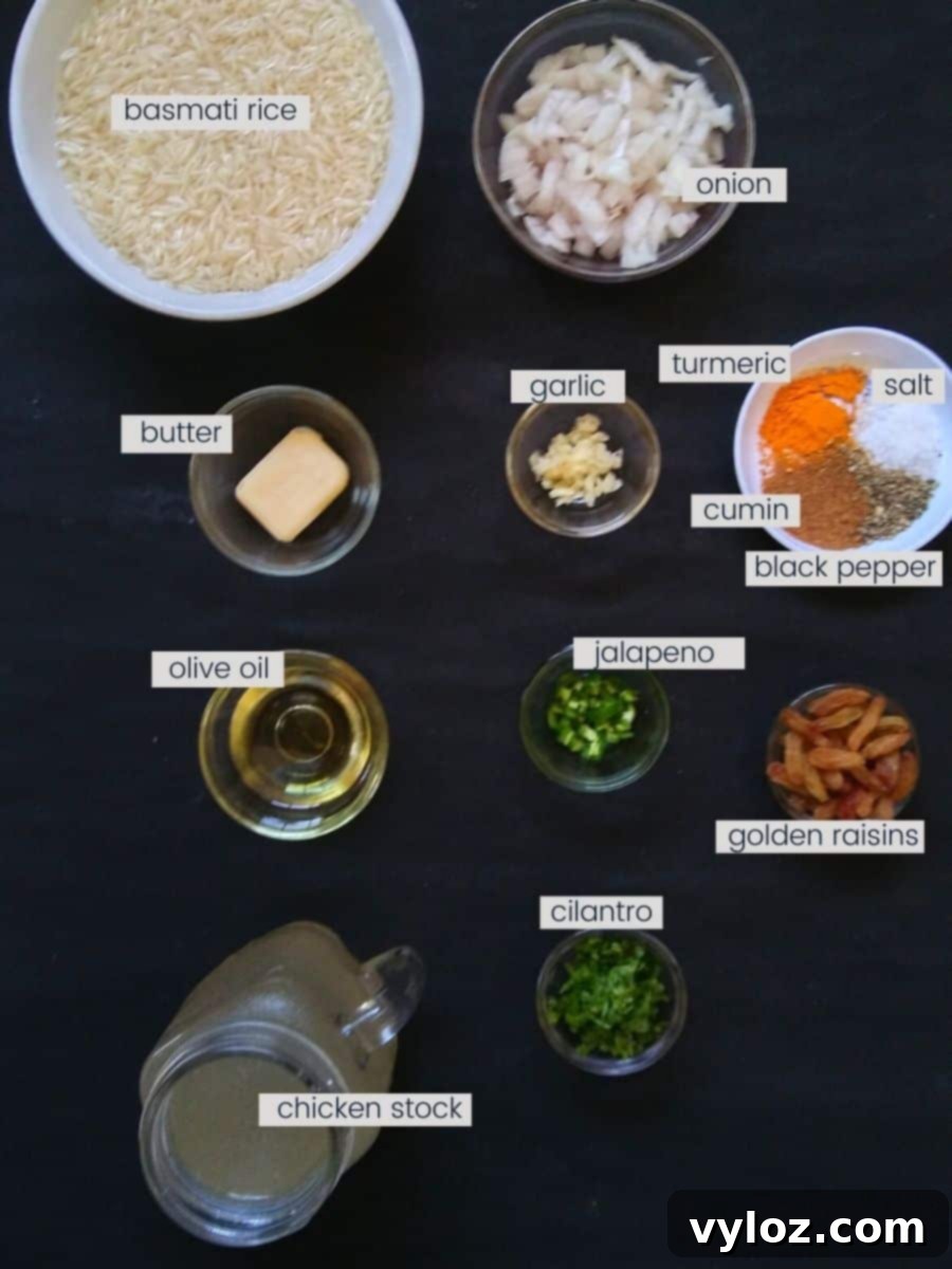 Mediterranean Sunshine Rice 3 Image showing ingredients for turmeric yellow rice are placed on a black background.