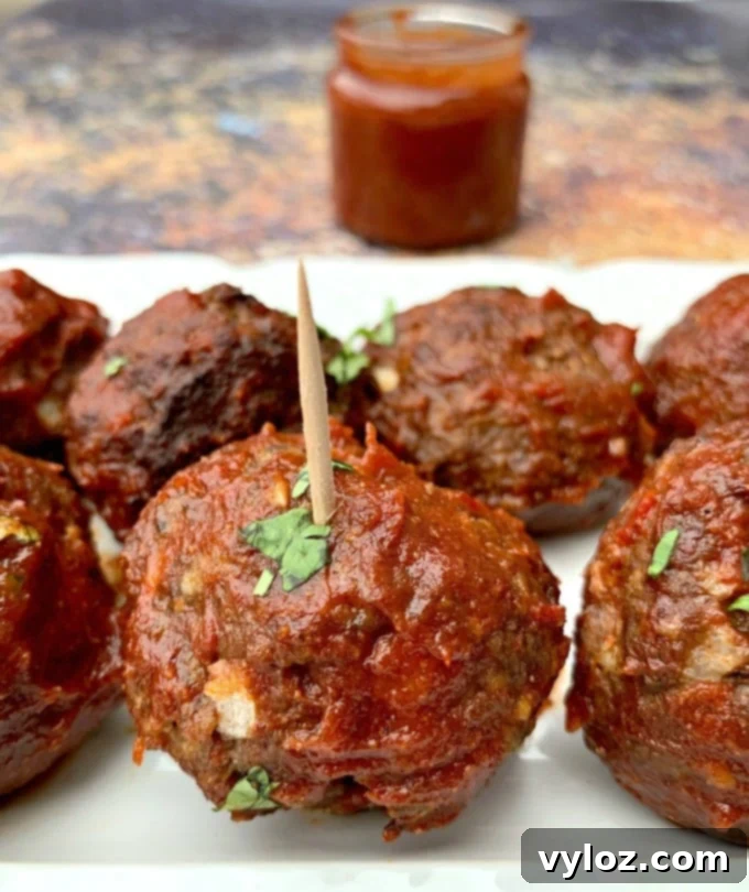 Air Fryer BBQ Beef Meatballs 10 Keto Low Carb Air Fryer Meatballs with BBQ Sauce plated with a side