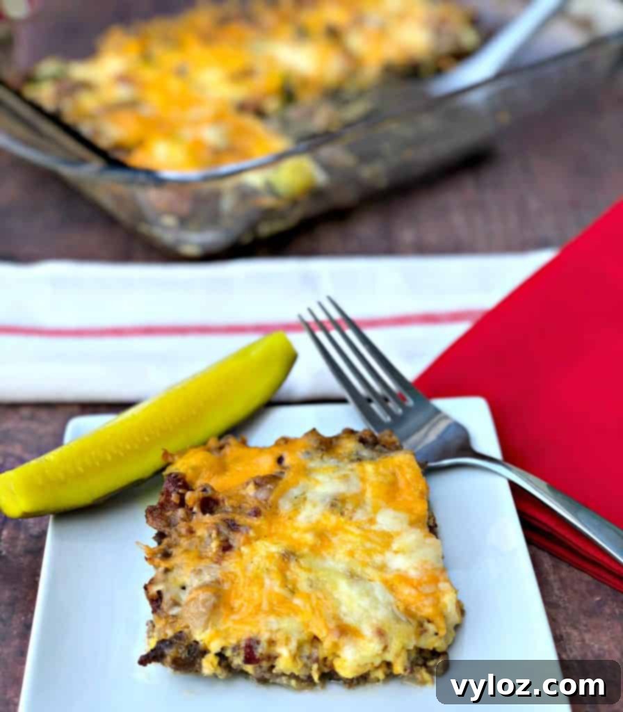 Savory Keto Low-Carb Bacon Cheeseburger Casserole with a pickle garnish