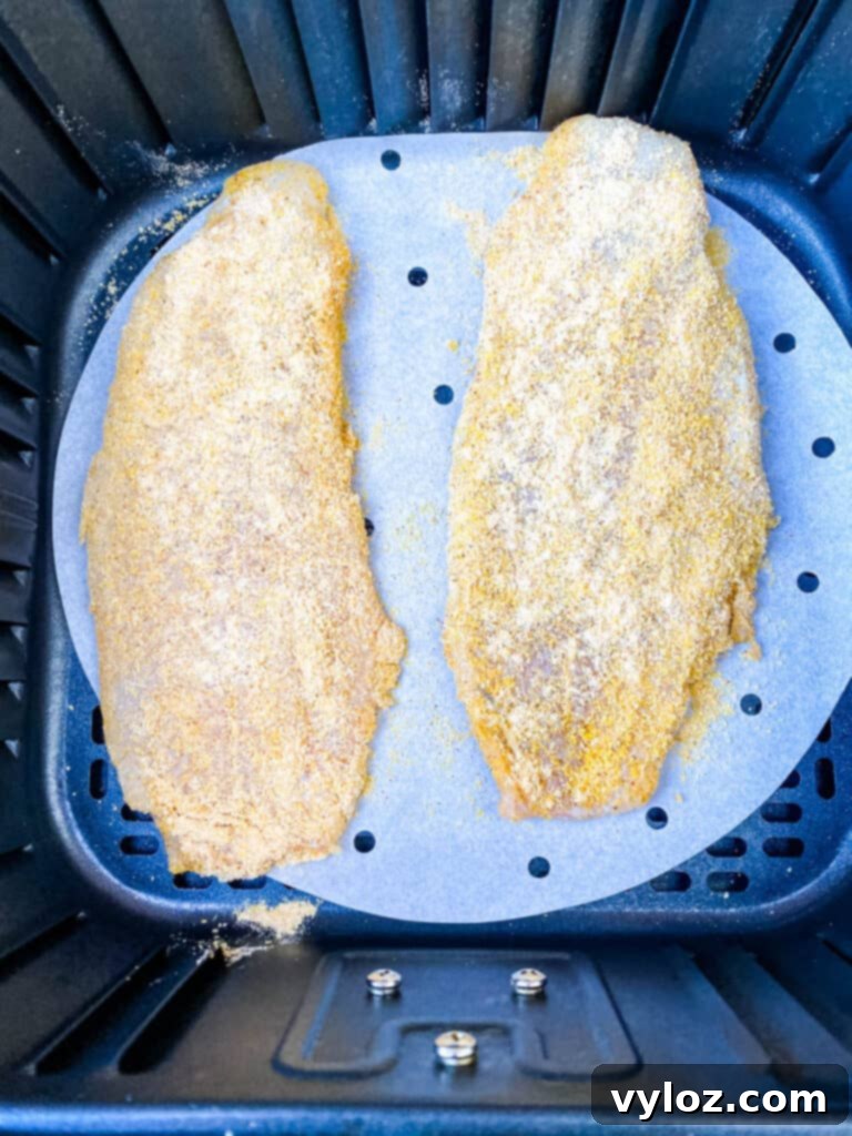 Crispy Air Fryer 3 Ingredient Fried Catfish served with lemon