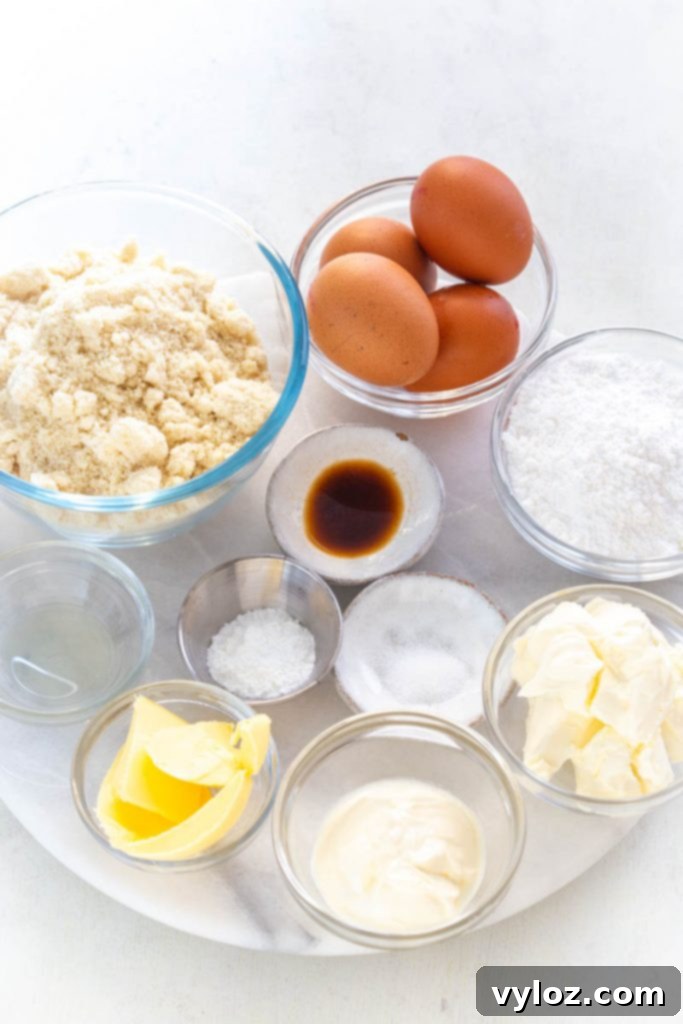 almond flour, raw eggs, butter, vanilla, and sweetener in separate bowls