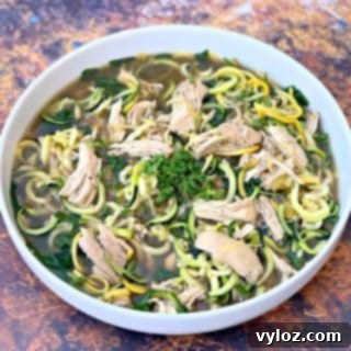 Keto Low Carb Instant Pot Chicken Zoodle Soup 11 keto low carb chicken noodle soup with zucchini noodles in a white bowl