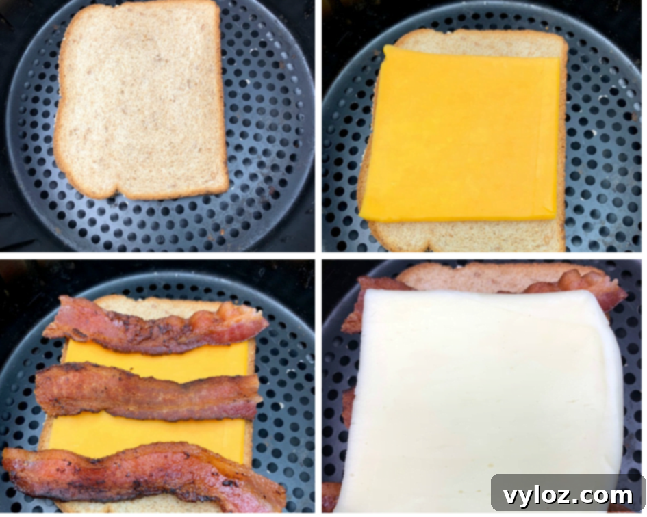 Crispy Air Fryer Grilled Cheese 3 Bread slices in an air fryer basket, layered with cheese and crispy bacon, ready to cook