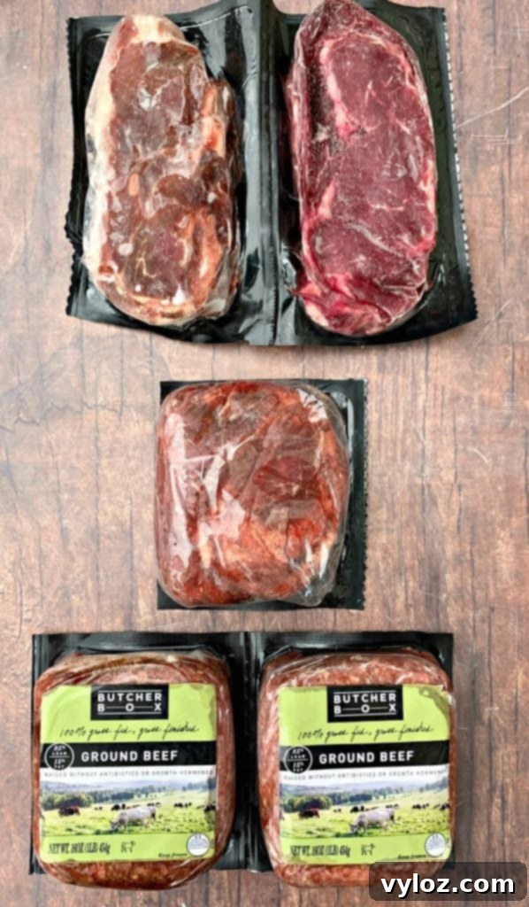 Butcher Box ground beef and steaks in packaging, neatly arranged for delivery.