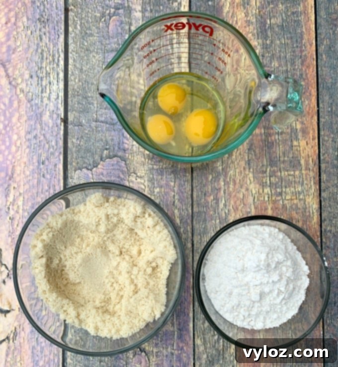 Simple Zesty Keto Lemon Bars 5 More ingredients for keto lemon bars in separate glass bowls