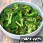 Roasted air fryer broccoli in a white bowl