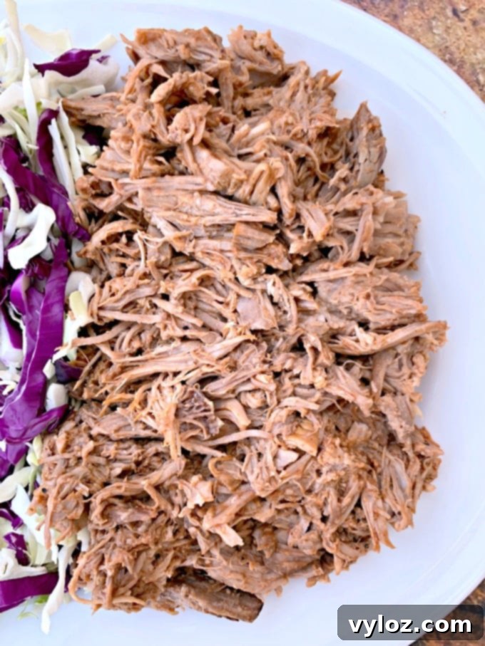 instant pot pulled pork on a white plate