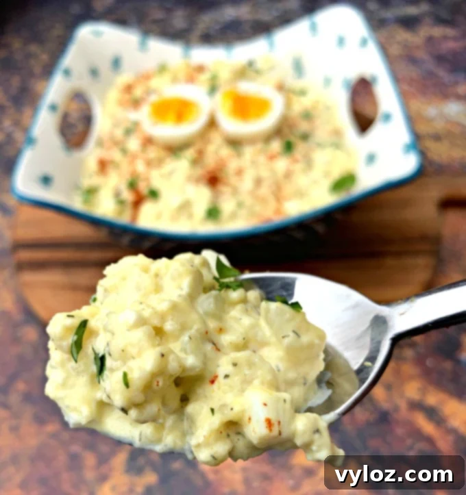 Keto cauliflower potato salad on a spoon