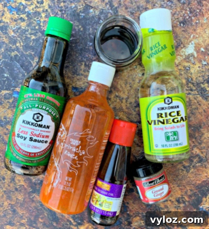 Collection of ingredients for Thai chicken salad and homemade peanut butter dressing