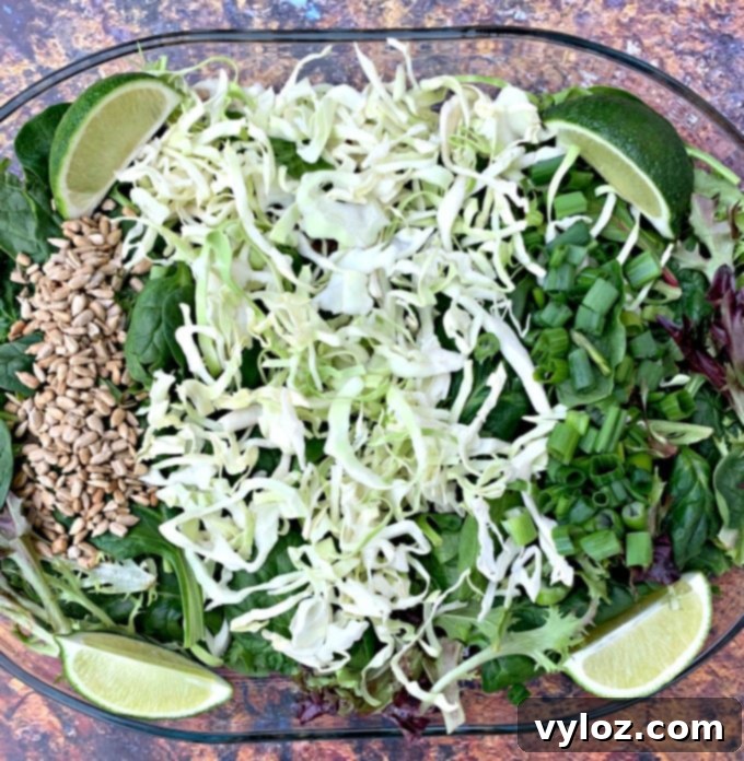 Freshly prepared Panera-style Thai chicken salad served in a clear bowl with vibrant ingredients