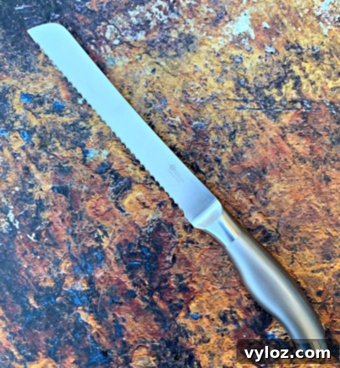 serrated bread knife on a flat surface