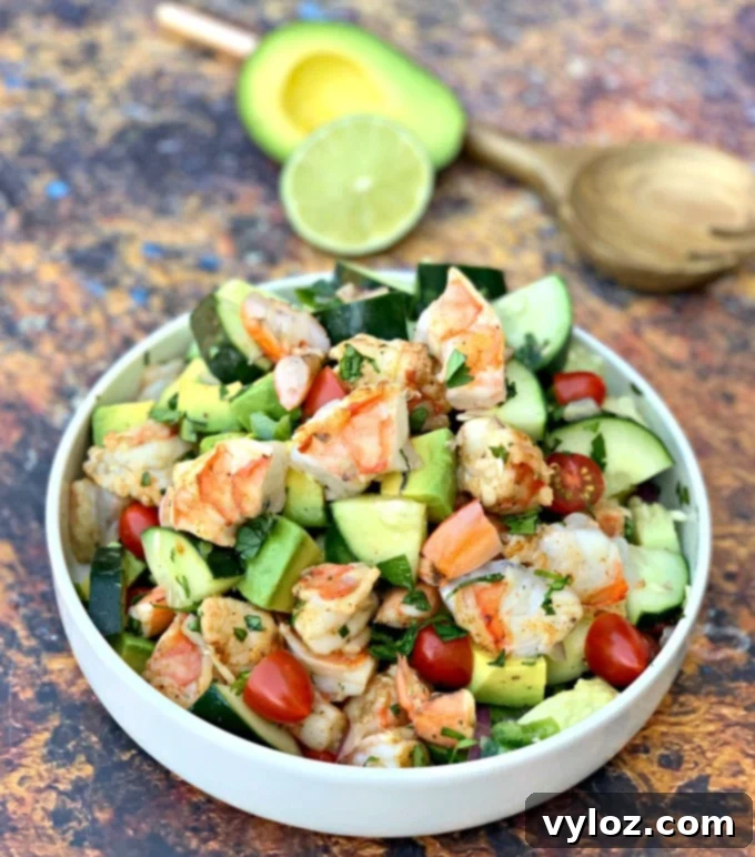 Vibrant Shrimp Avocado Salad 8 keto low carb shrimp avocado ceviche salad in a white bowl