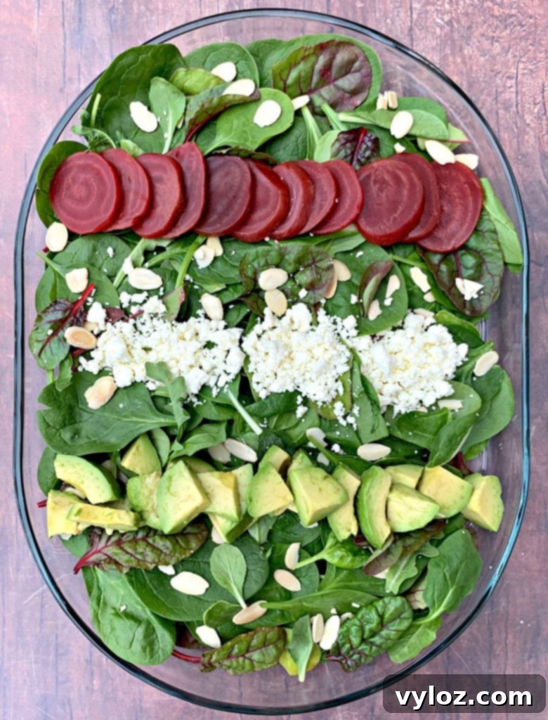 Vibrant Green Goddess Salad 4 A vibrant serving of Green Goddess Beet Salad on a white plate, beautifully garnished and ready to be enjoyed