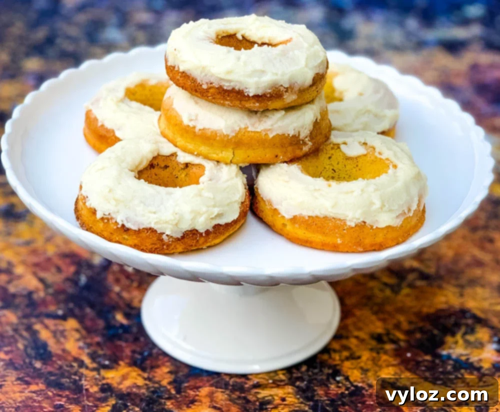 keto low carb glazed donuts on a white dessert tray