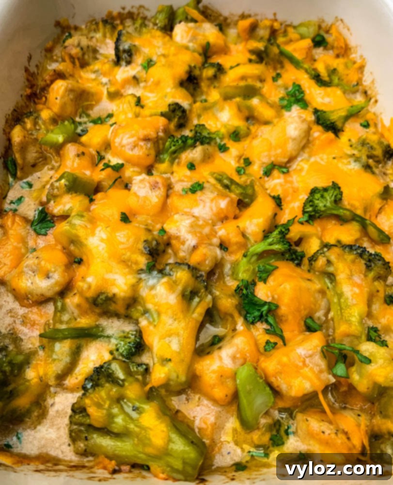 Easy Keto Chicken Broccoli Cheese Bake 11 close up photo Keto Broccoli Cheese Casserole in a baking dish