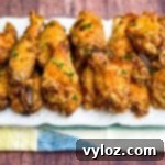 crispy air fryer keto fried chicken wings on a white plate