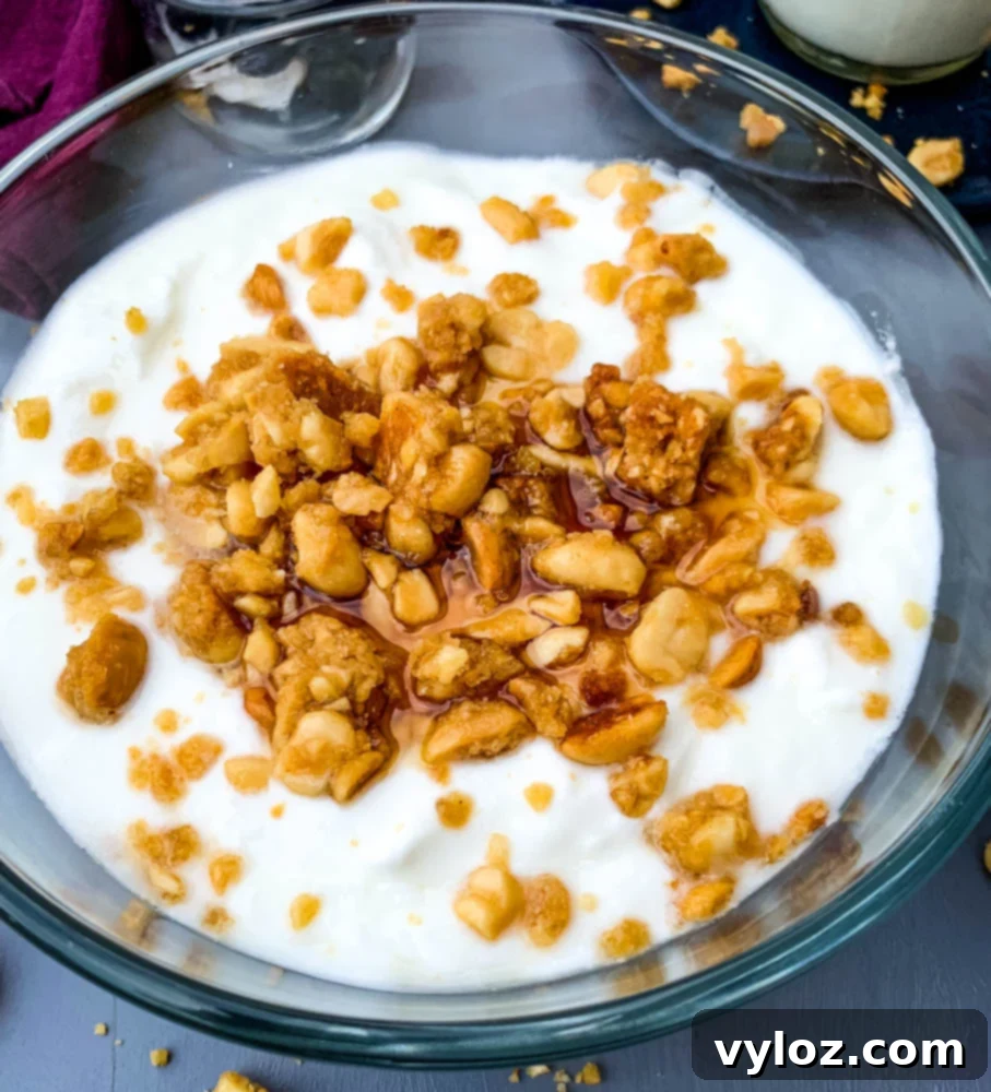 instant pot homemade yogurt in a glass bowl with granola