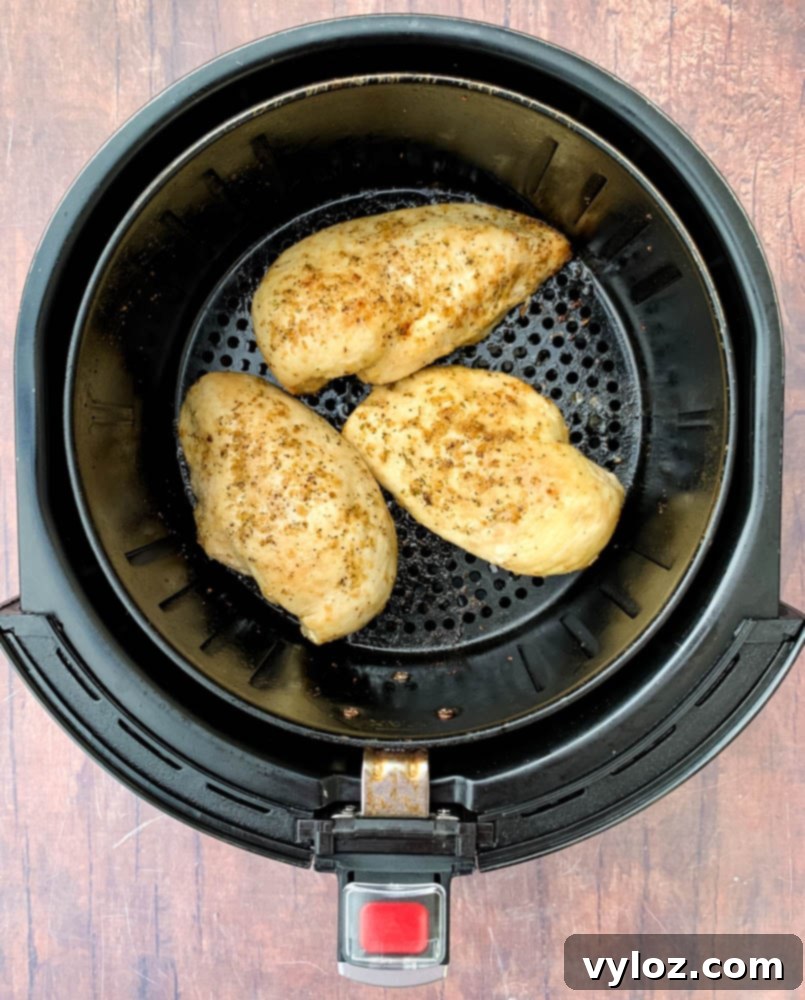 cooked chicken breasts in an air fryer