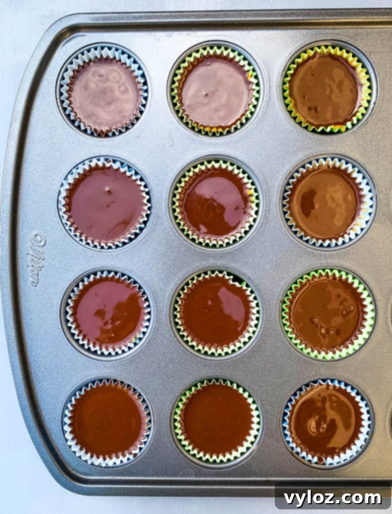 Sugar-free peanut butter cups neatly arranged on a blue plate.