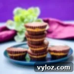 Keto Sugar-Free Peanut Butter Cups on a blue plate.