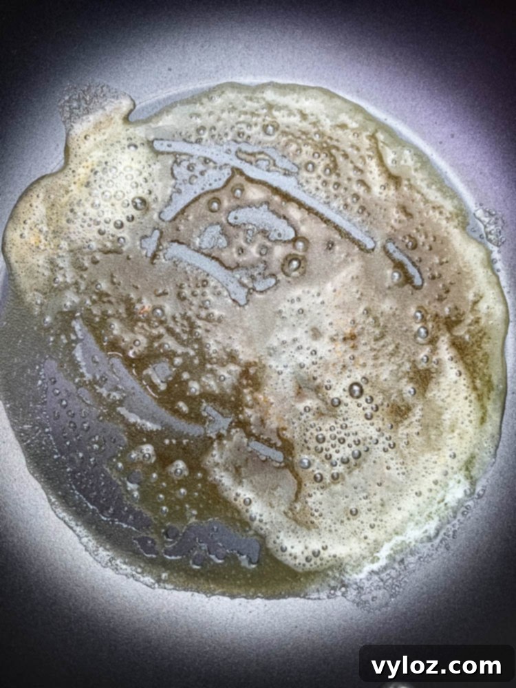 Rich Keto Gravy 4 melted butter in a skillet