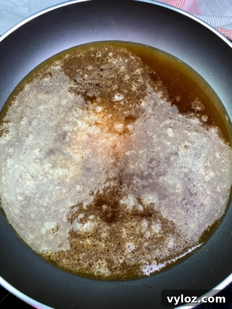 Rich Keto Gravy 5 keto low carb gravy in a skillet